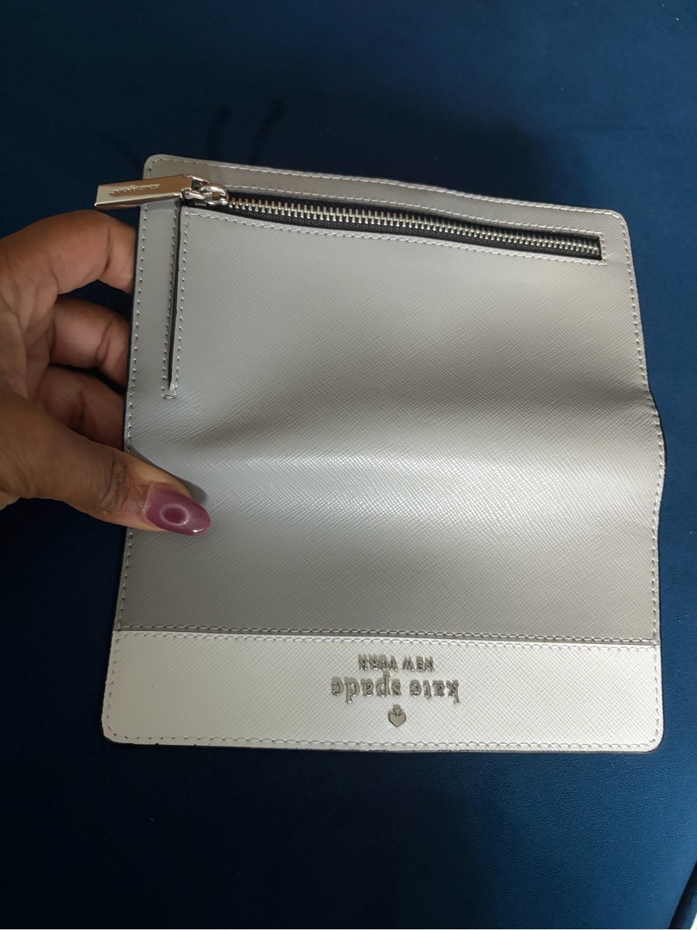 kate spade gray and white bifold wallet with silver hardware
